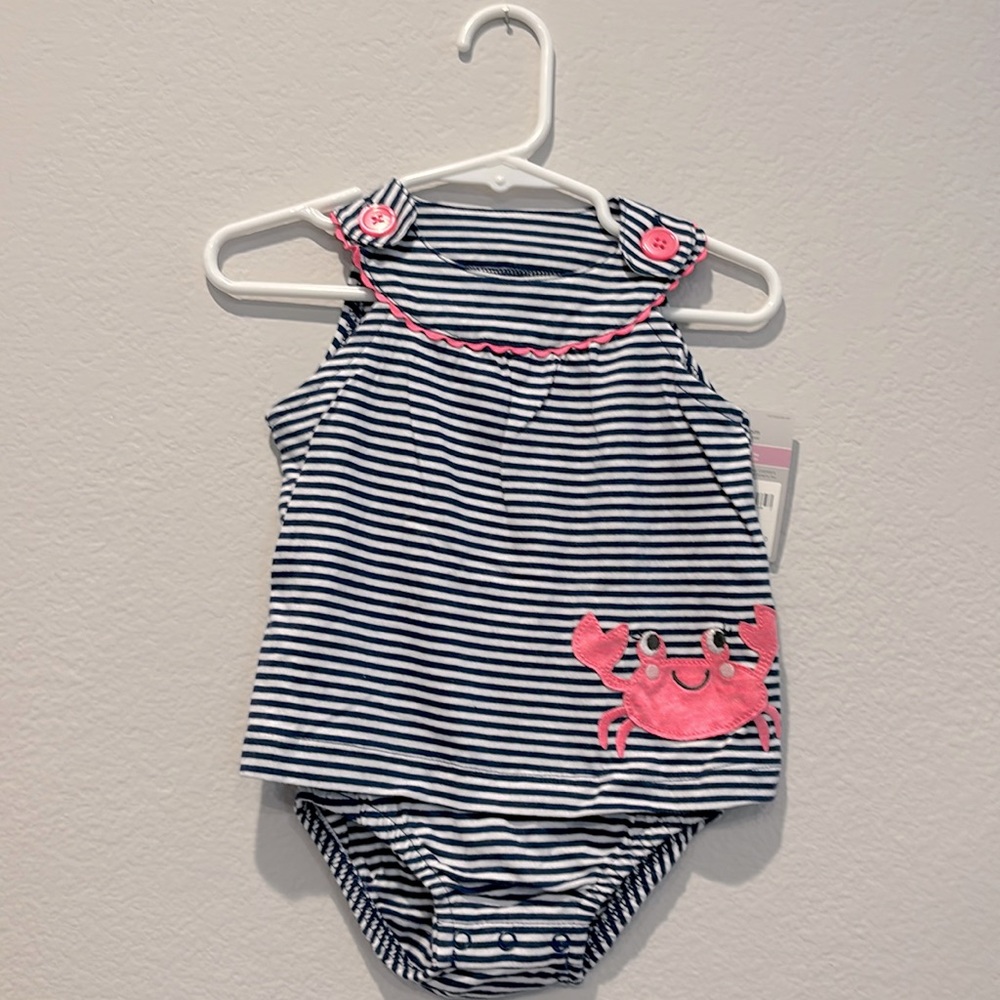 Carter’s play wear one piece dress size: 9 months